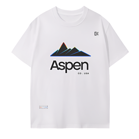 The UT059 T-Shirt by ODMPOD displays a graphic of stylized mountains over the word "Aspen," with "Co. USA" below. Crafted from soft cotton, it includes a small logo near the top right, offering both comfort and style for any adventure.