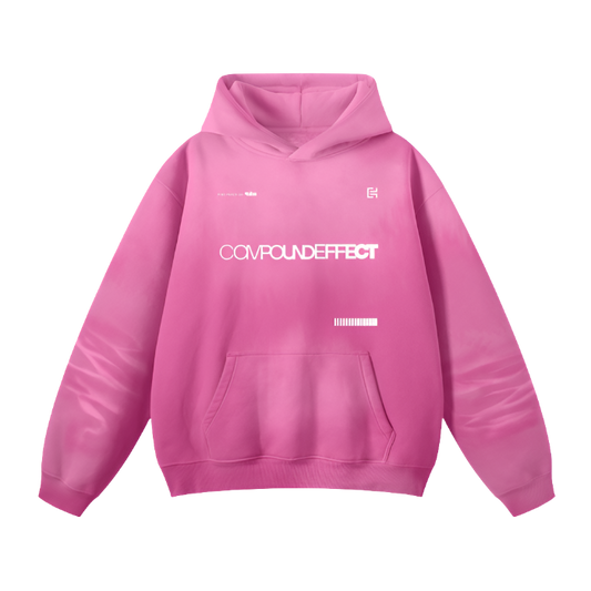 The ODMPOD UH016 Hoodie is a casual unisex piece in pink, featuring white text that reads "COMPOUND EFFECT" on the front. It includes a hood and a front pocket, adorned with minimalistic designs and symbols above and below the text.