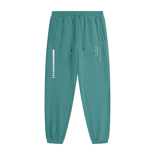 The ODMPOD Streetwear Unisex Fleece Joggers are turquoise sweatpants that feature an elastic waistband and cuffs. Made from soft cotton, they include a drawstring, two side pockets, and printed white text and graphics on the left thigh and right hip. This contemporary streetwear design is perfect for both men and women.