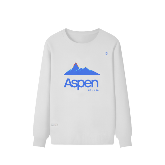 The ODMPOD UE003 ▪ Sweater is a unisex white sweatshirt featuring a blue mountain graphic with a bold red peak. The word "Aspen" is elegantly displayed beneath, along with "CO. USA." Crafted from 100% cotton, this long sleeve garment provides both comfort and style.